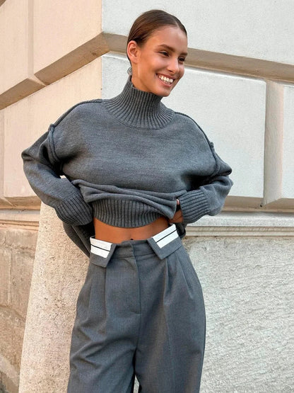 Jersey de punto suave con cuello alto y hombros caídos