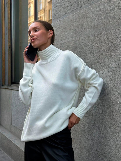 Jersey de punto suave con cuello alto y hombros caídos