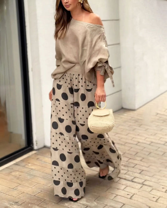Abby I Top con hombros al aire y pantalones estampados